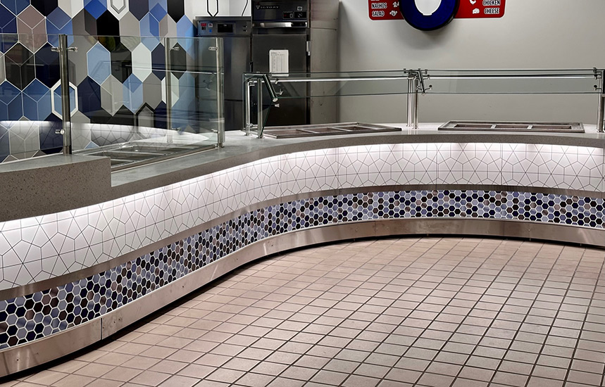 curved counter, tiled walls